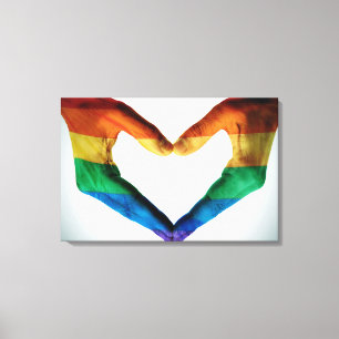 Toile Mains peintes comme coeur d'arc-en-ciel