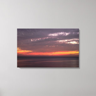 Toile Mer plate et ciel rouge
