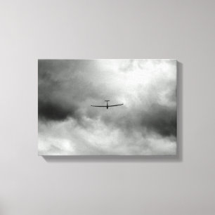 Toile Planeur volant dans le ciel gris