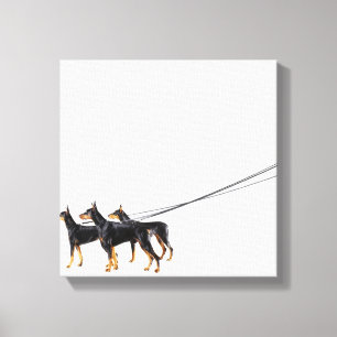 Toile Trois dobermann sur la laisse