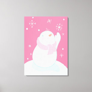Toile Un bonhomme de neige atteignant pour un flocon de