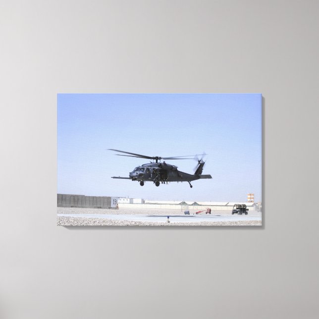Toile Un HH-60G Pave Hawk décolle du Camp Bastio (Recto)