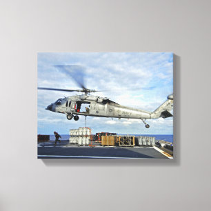 Toile Un MH-60S Seahawk prépare pour livrer l'ammunitio