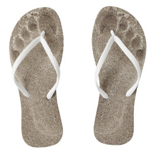 Tongs Les pieds dans le sable