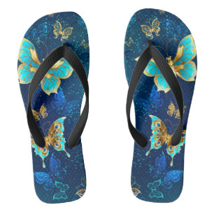 Tongs Papillons d'or sur un Arrière - plan bleu