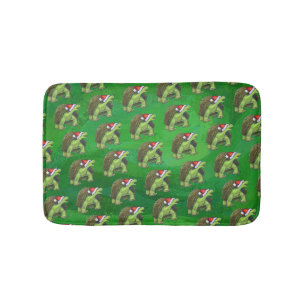 Tortoise in der Weihnachtsmannmütze auf grün Badematte