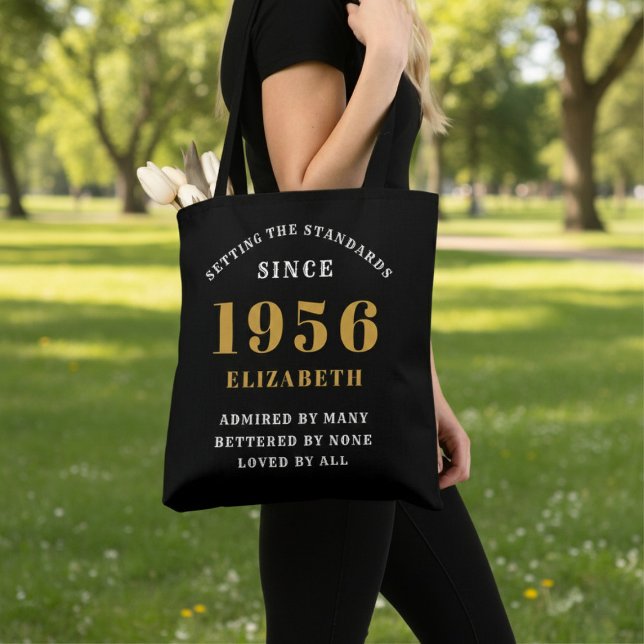Tote Bag 70th Birthday 1956 Black Gold For Her Personalized (Born 1956 birthday tote bag. Background out of focus.)