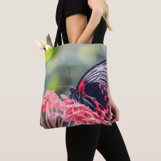 Tote Bag A striking red‑and‑black butterfly B