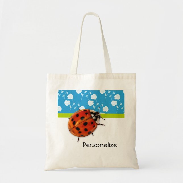 Tote Bag Coccinelle florale bleue à la mode avec le nom (Devant)