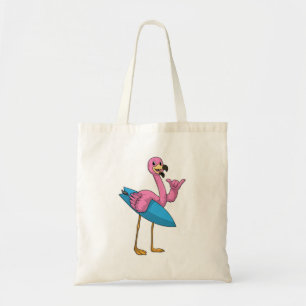Tote Bag Flamant rose comme Surfer avec Surfboard