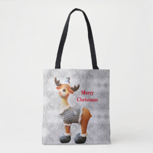 Tote Bag Joyeux Noël orignal portant un chapeau
