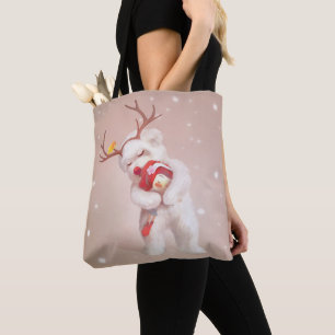 Tote Bag La fille serrant le chien dans les Antlers de renn