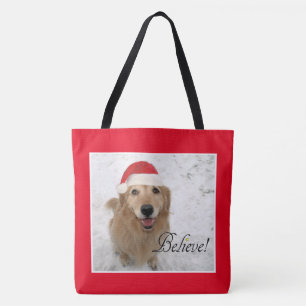 Tote Bag Le chien de golden retriever croient Noël