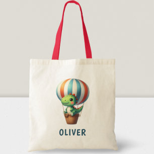 Tote Bag Le Dino Vert mignon prend l'avion dans un ballon à