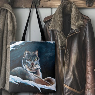 Tote Bag Lynx hivernal majestueux se reposant sur une monta
