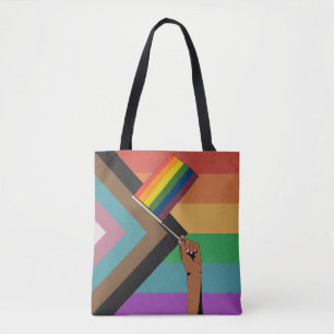 Tote Bag Main tenant un drapeau de la fierté