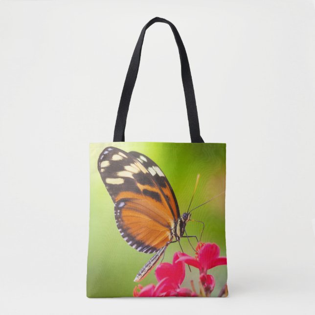 Tote Bag Papillon à longue aile sur une fleur rouge (Devant)