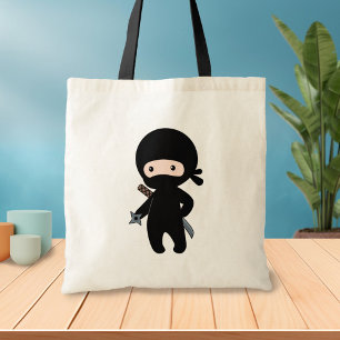 Tote Bag Tiny Ninja tenant l'étoile à lancer