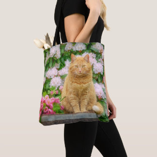 Tote Bag Un chat orange dans un jardin aux fleurs de printe