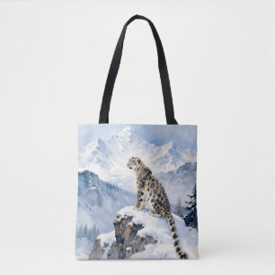 Tote Bag Un léopard des neiges sur un pic enneigé