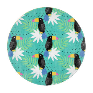 Toucans auf aquamarinem schneidebrett