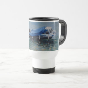 Tournez la tasse avec le couvercle.