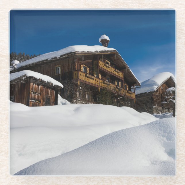 Traditionelle Holzhütten im Schnee Glasuntersetzer (Vorderseite)