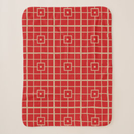 Traditionelles geometrisches Muster aus Rot und Go Sherpadecke
