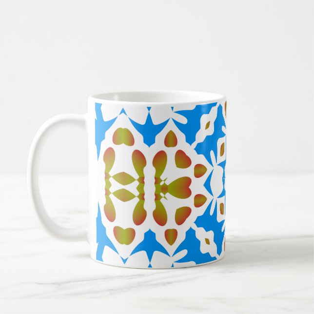 Traditionelles verziertes mexikanisches Talavera.  Kaffeetasse (Links)