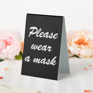 Tragen Sie eine Maske, ein schwarz-weißes, elegant Tischaufsteller