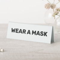 Tragen Sie eine Maske, schwarz und weiß elegant