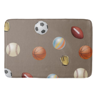 Trägt des Balls auf einer Badmatte zur Schau Badematte