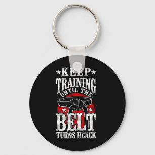 Training behalten, bis der Gürtel schwarze Karate Schlüsselanhänger