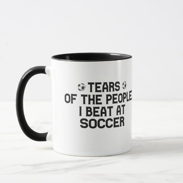 Tränen der Leute, die ich im Fußballfeuer trage Tasse (Links)