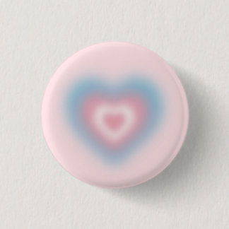 Trans Fahnen Farben auf einem verschwommenen Herz Button