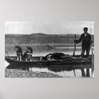 Trapper in Kanu mit Hunden und Hunden Alaska