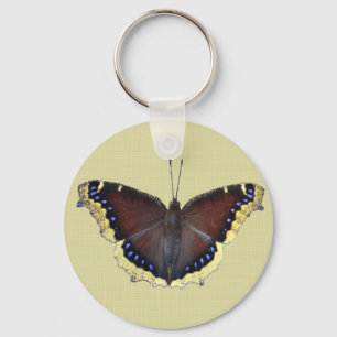 Trauernder Schmetterling in der Cloak - Nymphalis- Schlüsselanhänger