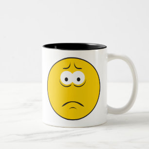 Trauriges Stirnrunzelndes Gesicht Zweifarbige Tasse