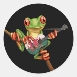 Tree Frog Playing Welsh Flag Gitarre Schwarz Runder Aufkleber