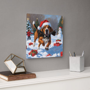 Treten Walker Coonhound Schnee mit Weihnachtshut Quadratische Wanduhr