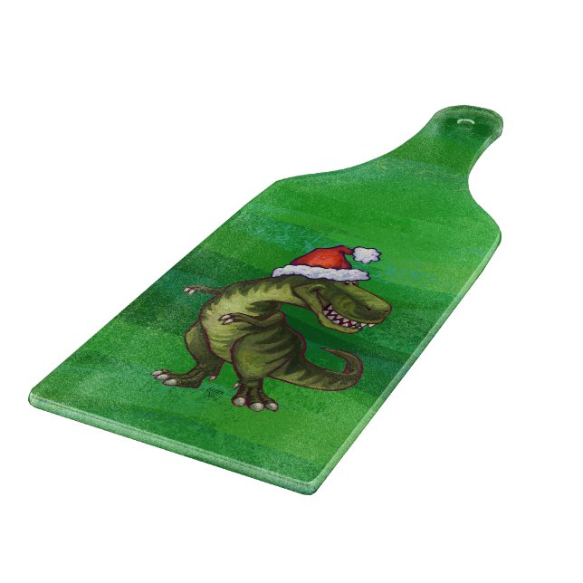 TRex in Weihnachtsmannmütze auf Grün Schneidebrett (Ecke)