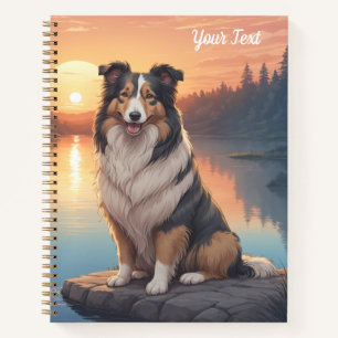 Tri-farbiger Collie am See Notizbuch