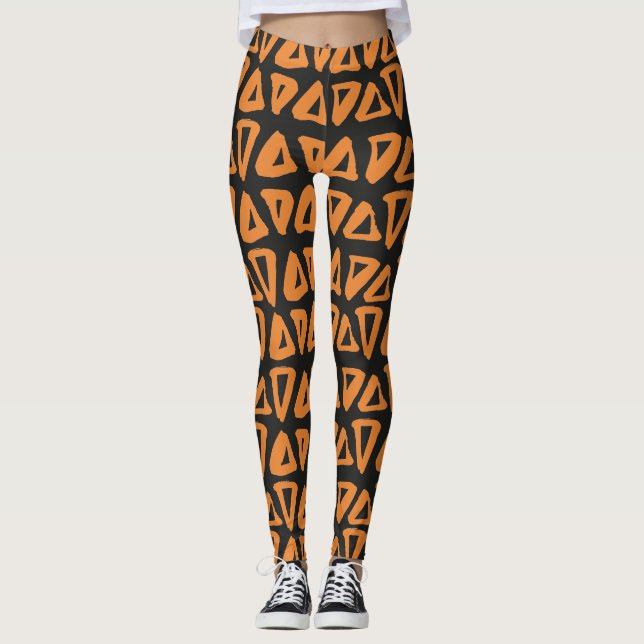 Triangles Tribaux Leggings noirs orange (Devant)