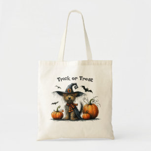 Trick oder Treat Halloween Hund in einem Hexenhut Tragetasche
