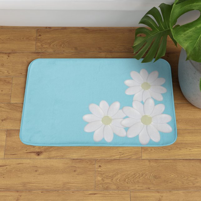 Trio of White Daisy Blume Aqua Blue Bath Mat Badematte (A trio of daisies on this aqua blue bath mat. )
