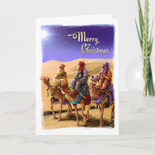 Trois hommes sages peignant des cartes de Noël
