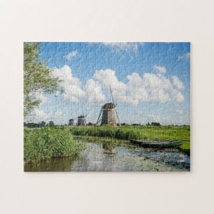 Trois moulins à vent et un puzzle denteux de canal