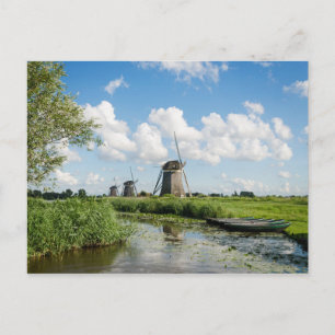 Trois moulins à vent et une carte postale de canal
