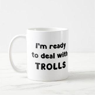 Trolle mit kaffeetasse