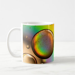 Tropfen aus grünem und gelbem Wasser Kaffeetasse